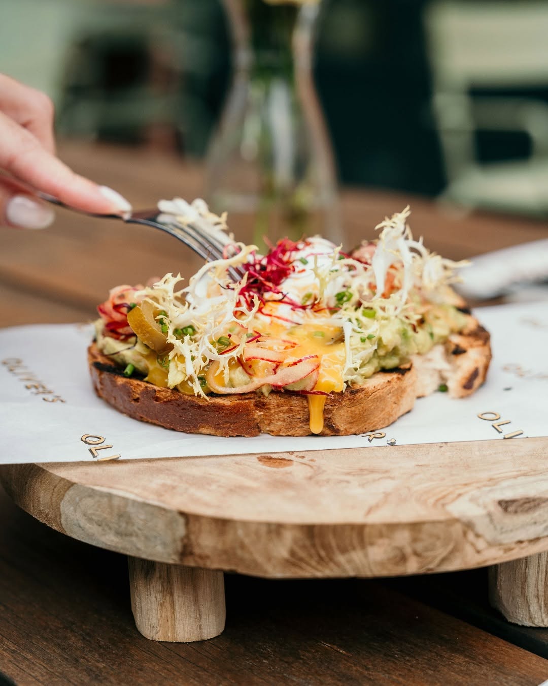 Olivers Amsterdam - Healthy smashed avocado toast with poached egg